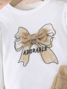 Conjunto casual de 2 piezas para niña con camiseta de manga larga con estampado de moño y falda corta fruncida con decoración de botones, adecuado para primavera y otoño - Caqui - Ver 7