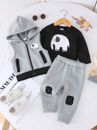 3 件套：男婴大象热转印装饰前开帽衫背心、日本面料大象印花圆领长袖运动衫和松紧腰部刺绣休闲裤，秋冬