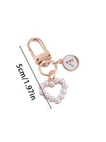 这款包包挂饰采用A-Z字母和心形珍珠钥匙扣设计，风格时尚简约。它适合搭配万圣节装扮，也适合大学生和小学生佩戴。此外，它还可以用作包包挂饰、车钥匙扣，或作为生日、节日、开学季和万圣节的小礼物。 - 彩色 - 查看 9