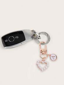 这款包包挂饰采用A-Z字母和心形珍珠钥匙扣设计，风格时尚简约。它适合搭配万圣节装扮，也适合大学生和小学生佩戴。此外，它还可以用作包包挂饰、车钥匙扣，或作为生日、节日、开学季和万圣节的小礼物。 - 彩色 - 查看 6