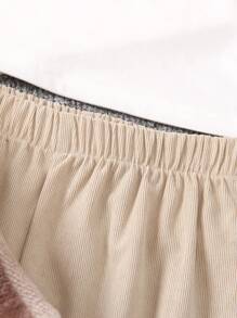 Set da 3 pezzi: 1 giubbotto corto reversibile a quadri nuovo per l'autunno/inverno 2024, 1 paio di pantaloncini a tinta unita, 1 canotta e 1 paio di pantaloni a zampa - Albicocca - Visualizzare 5