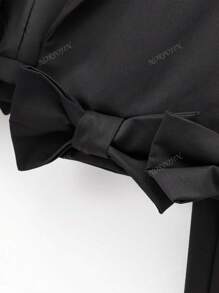 Chaqueta tipo blazer informal de longitud corta con decoración de lazo en el bajo