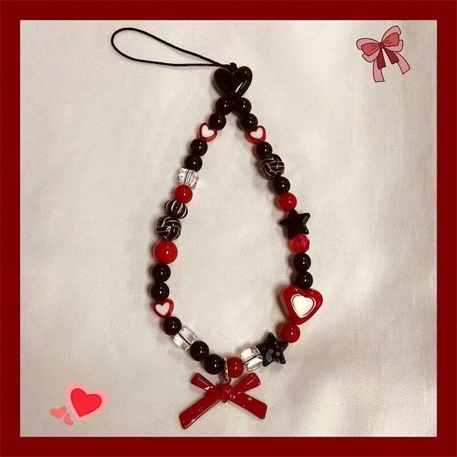 手工制作的 INS 风格串珠手机挂绳，配有蝴蝶、蝴蝶结和心形吊坠，简约相机带吊饰，适合送给母亲、家人、朋友、生日、节日手机吊饰、手机链的礼物 - 黑珠紅白愛心蝴蝶結掛繩 - 查看 1
