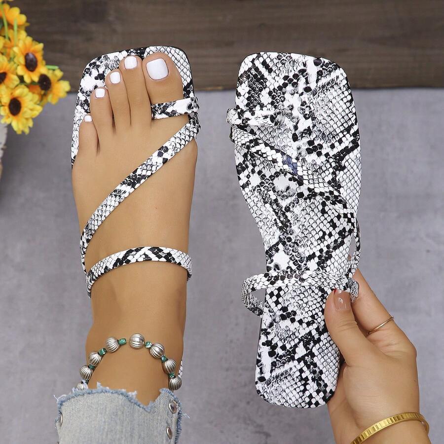 女士时尚平底人字拖凉鞋，蛇纹图案，轻便舒适，适合海滩、日常穿着 - 黑與白 - 查看 1