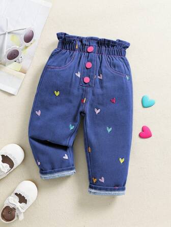 Pantalones vaqueros casuales y versátiles para uso diario con bordado asimétrico en forma de corazón, para bebé niña