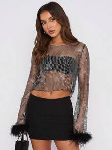 Blusa transparente de malla con top corto, camisa de manga larga con aplicaciones de strass y puños con plumas, color negro/rosa transparente - Negro - Ver 1