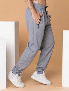 带前口袋和拉链的运动裤 - 灰色 - 查看 2