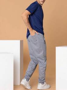 带前口袋和拉链的运动裤 - 灰色 - 查看 5