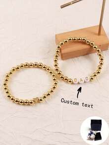 可定制优雅风格金色串珠手链套装，可堆叠字母珠，带有姓名/口号/专辑标题/音乐会支持个性化设计，适合生日、情人节、周年纪念日，送给女朋友、男朋友、朋友的礼物 - 橘色 - 查看 1