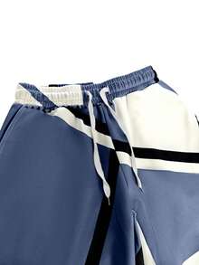 Zestaw 2 szt.: Koszulka z nadrukiem w bloki kolorów, z okrągłym dekoltem i długim rękawem oraz spodnie ze ściągaczem w pasie, swobodny strój wypoczynkowy lub odzież uliczna, jesień/zima