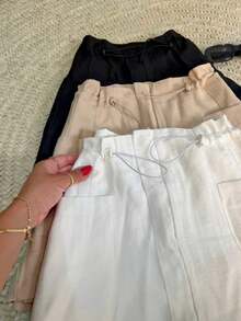 Women's Short Skirt, Tailored, Plain, Short, Side Pockets, Adjustable Elastic At The Waist. - màu đen - Xem 1