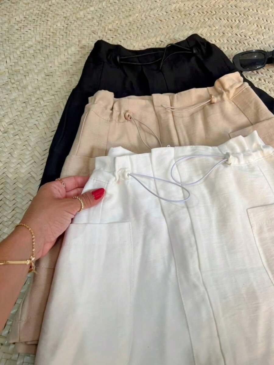 Women's Short Skirt, Tailored, Plain, Short, Side Pockets, Adjustable Elastic At The Waist. - màu đen - Xem 1