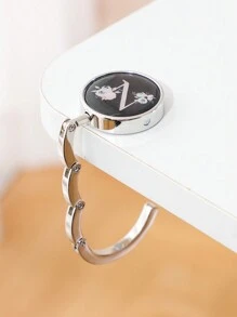 1 pieza Soporte plegable de metal con letra inicial - Diseño floral de letra, Soporte de cartera de escritorio, Estantería de moda para bolsos y Organizador de escritorio de oficina para damas - gancho de letra negro - Ver 17