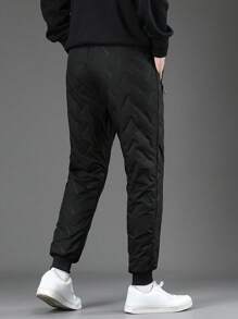 1件青少年男童加厚保暖宽松休闲运动裤，适合秋冬季穿着