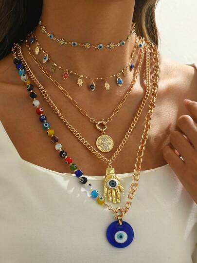 Collar de lujo de moda para mujer con múltiples capas y colgante de ojo azul malvado, un collar de cadena gruesa en forma de U con cuentas de vidrio, un colgante exagerado de mano y ojo como decoración para uso diario y de fiesta, con cuentas de ojo de color distribuidas aleatoriamente