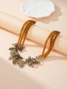 女士时尚串珠项链。植物和玻璃多层串珠。铜合金材料，顶级工厂设计，复古金属质感。奢华珠宝闪闪发光，给人一种庄严的感觉。精湛的工艺。每件作品都经过独特设计和手工制作，展现了我们工匠的技能和热情。 - 彩色 - 查看 2