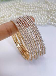1 Set di braccialetti con perle sintetiche, estremamente delicati, adatti per le donne