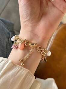 1pc Compatible With Apple Watch Bracelet Apple WatchBand Women's Exquisite Pendant Bracelet Gold Compatible With Apple Watch Strap 38/40/41/42/44/45/46/49mm Ultra 2/1 Marine Metal Bracelet With Pink Starfish, Pearl Conch And Shell Pendant Bohemian Holiday Style Creative Dopamine Color System Is Suitable For Apple Watch Series 9/8/7/6/5/SE4/3/2/1. Apple Watchband Accessories