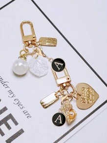 1 Stück Schlüsselanhänger mit Buchstaben A-Z in Schwarz, geeignet zum Aufhängen an Taschen, zum Dekorieren von Rucksäcken, kann auch als Autoaccessoire verwendet werden, ein tägliches Geschenk für Frauen - Schwarz - Übersicht 7