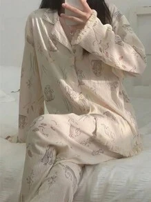 两件套女士睡衣套装，杏色兔子印花流苏上衣，纽扣前开襟长袖上衣搭配宽松长裤，适合春秋季居家穿着，两件套，秋冬服装