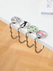 1 pieza Colgador de cartera para mujer - Colgador de bolso plegable, estilo retro, material de metal, patrón de cielo estrellado de noche, accesorio de moda/moda para mujer, elegante y portátil