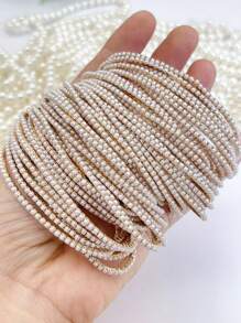 1 Set di braccialetti con perle sintetiche, estremamente delicati, adatti per le donne