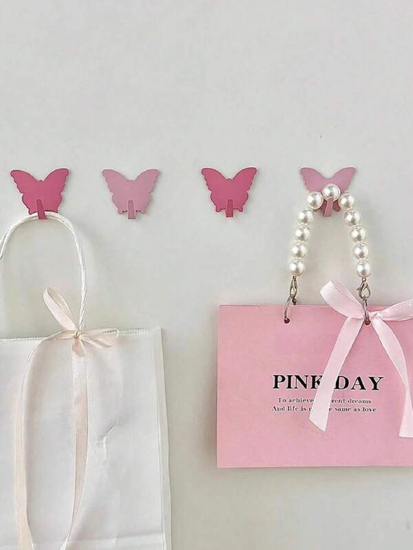 1/3/5 Piezas de ganchos decorativos de pared de color rosa con diseño de mariposa. Ganchos sin taladro. Muy adecuados para la decoración de la habitación de una niña. Estilo minimalista. Utilizados para colgar llaves, abrigos, toallas, sombreros, joyas, paraguas, etc. Adecuado para sala de estar, dormitorio, oficina.