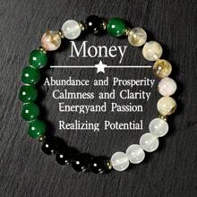 手工制作的手链，设计象征着富足和繁荣，男女皆宜。手链尺寸适中，由松紧带制成，配有 8 毫米黄水晶珠，用于平衡能量。这是一件完美的珠宝礼物。 - 彩色 - 查看 1