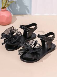 1 par de sandalias planas negras para niñas pequeñas con lazo transparente de malla, cierre de gancho y bucle, suela antideslizante, sandalias romanas lindas y elegantes, adecuadas para niñas de 3 a 12 años para uso diario, vacaciones y fiestas