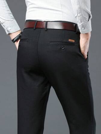 Enfärgade mäns enfärgade byxor med flera fickor