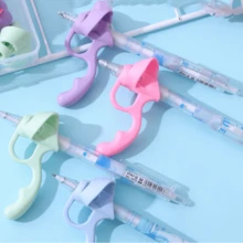 5 指握笔器、儿童书写辅助器、硅胶手指握笔器、学龄前书写训练工具、儿童便携式握笔器、书写学习用品 - 彩色 - 查看 5