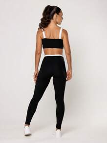 LOT FITNESS Elevate Women's Gym Set - Black Top With White Cutout And Fitness Leggings - 黑色 - 查看 2
