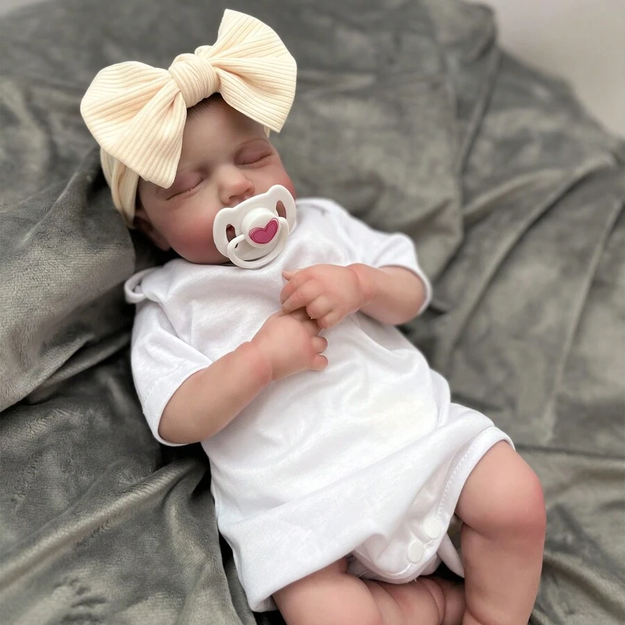 栩栩如生的重生硅胶娃娃 - 逼真的青少年，身体柔软灵活，布质服装和附加套装，适合青少年和青春期前儿童，工匠精心制作的发型，配有奶瓶、磁性安抚奶嘴、尿布、用户手册、窒息警告 - 白色 - 查看 1