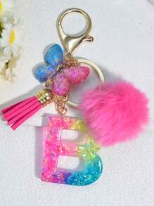 1 pièce Porte-clés en résine à lettres bicolores, pendentif de sac mode avec pompon à gland papillon, cadeau pour amis et école