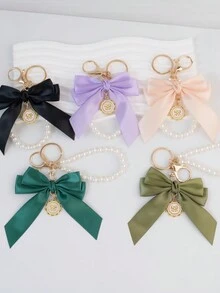 1 Mặt dây chuyền móc khóa trang trí bằng ngọc trai giả và nơ lớn thanh lịch, được trang bị thẻ treo ngọc trai hướng dương sáng tạo màu trắng, Phụ kiện thắt nút vải ruy băng cá nhân hóa nhiều màu sắc, Phụ kiện tai nghe và túi đựng điện thoại, Hoàn hảo làm quà tặng cho bạn thân - trắng - Xem 3