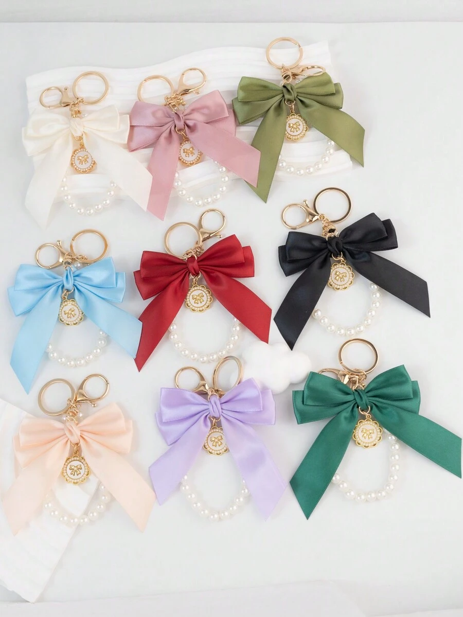 1 Mặt dây chuyền móc khóa trang trí bằng ngọc trai giả và nơ lớn thanh lịch, được trang bị thẻ treo ngọc trai hướng dương sáng tạo màu trắng, Phụ kiện thắt nút vải ruy băng cá nhân hóa nhiều màu sắc, Phụ kiện tai nghe và túi đựng điện thoại, Hoàn hảo làm quà tặng cho bạn thân - trắng - Xem 1