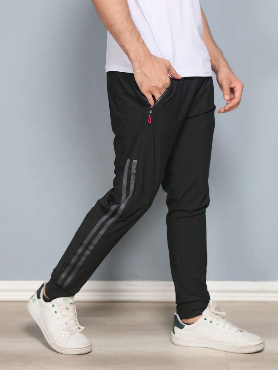 Running Men Drawstring Waist Zipper Pocket Sports Pants Imported Quick-Drying Fabric Plain - Black - View 1