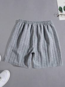 男式抽绳腰部口袋休闲提花短裤