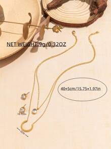 3 件套不锈钢与合成锆石马蹄形吊坠项链和耳环套装，适合女性日常通勤的优雅珠宝 - 金色 - 查看 3