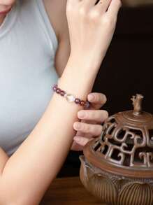 VE [VE] 1 pieza Pulsera de cuarzo de fantasma púrpura natural de alta calidad. El cuarzo de fantasma púrpura brilla como el cielo nocturno, misterioso; la Pagoda Blanca se yergue alta, simbolizando la resistencia. Los dos se integran de manera ingeniosa en la pulsera, representando protección y fuerza, agregando un Charm único para proteger cada momento de paz y buena fortuna. El color de la piedra natural es aleatorio.