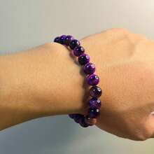Bracelet pierre œil de tigre galaxie naturel 8 mm. Cette pierre naturelle symbolise la richesse et la bonne chance. Peut être offert en cadeau à la famille et aux amis (sans étiquette)