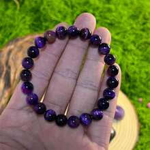 Bracelet pierre œil de tigre galaxie naturel 8 mm. Cette pierre naturelle symbolise la richesse et la bonne chance. Peut être offert en cadeau à la famille et aux amis (sans étiquette)