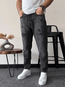 Jeans de mezclilla negro distressed y lavado casual y sencillo