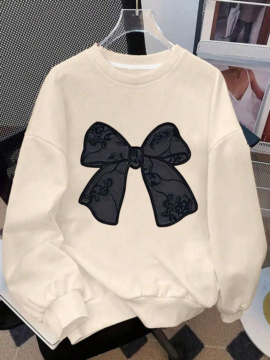 女童蝴蝶結印花圓領舒適休閒衛衣,秋冬時尚可愛服飾,適合旅行與外出穿著 - 杏色 - 查看 1