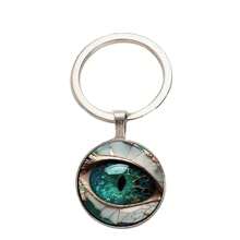 Vintage Stil Schlüsselanhänger aus Zink-Legierung mit mystischem Augen-Design - einzigartiges Modeaccessoire für Männer, perfektes kreatives Geschenk als Autoschmuck oder Taschenanhänger