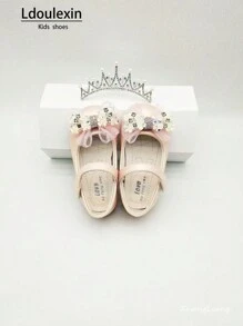 Nuove scarpe piatte con fondo morbido antiscivolo per ragazze con fiocco e design a strappo, stile principessa