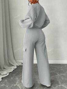 Ensemble de 2 pièces pour femmes Amarilo, veste à détail de fermeture éclair à manches longues et pantalon droit, de couleur unie texturée, style décontracté et mode, pour la saison scolaire