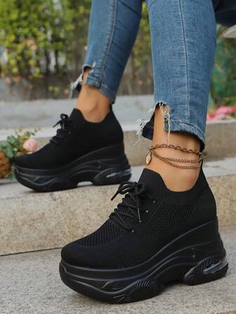 秋冬女式厚底运动鞋针织面料一脚蹬坡跟运动鞋，黑色