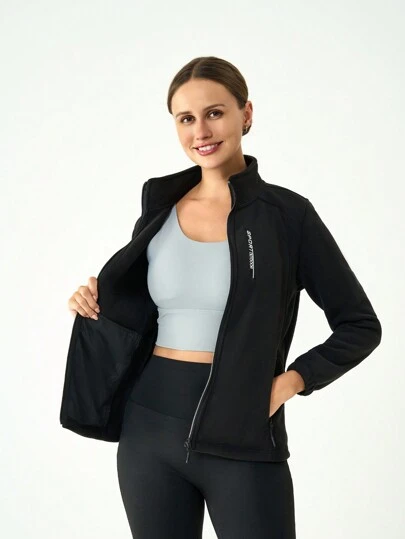 女士立领抓绒外套，透气保暖，修身剪裁，适合徒步旅行等户外活动，春秋冬季皆宜。