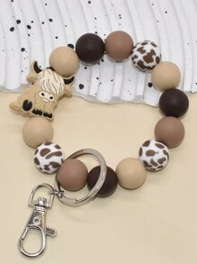 1 pieza Diseño de vaca de las tierras altas al estilo occidental Encanto de vaca de silicona Llavero Muñequera Cordón Diseños S para mujer Accesorios de coche Encanto de bolso Día de los maestros Ideas de regalo de Navidad Bolsa Cordones con soporte para identificación Accesorios de coche Encantos de bolso - Multicolor - Ver 6